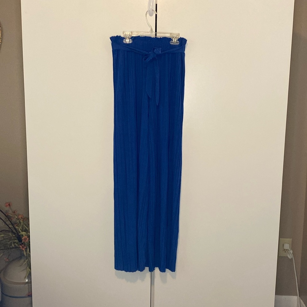 Royal blue stretchy wide leg high waist pants. No pockets.